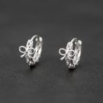 color: Hollow Bow Earrings / Style: Silver