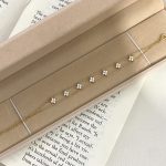color: 18K gold [7 four-leaf clover]]