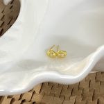color: 18K gold [with silver earplugs]]