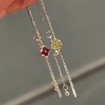 color: Red stone + white gold