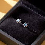 color: White gold opal earrings