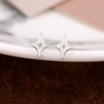 color: White gold four mans star stud earrings