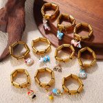New Stainless Steel Plated 18K Gold Pendant Ring Dripping Light Luxury Ornament