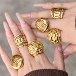 Retro Stainless Steel Weaving Hollow Ring Female 18K Gold Color Protection Design Light Luxury Ring