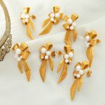 New Texture Bow Shape Inlaid Shell Pearls Design Stainless Steel Earrings Personality