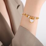 color: E464-Gold White Sea Shell Bracelet