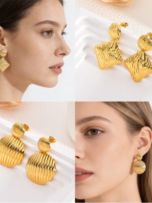 Golden stainless steal earrings, light luxury, high-end, exaggerated earrings, designed for autumn and winter, women's round ear studs.