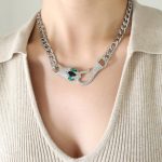 color: P1237-Green Eye Black Head Steel Color Necklace