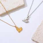 Simple Three-Dimensional Small Heart Necklace Female Peach Heart Asymmetric Irregular Advanced Design Stainless Steel Clavicle Chain