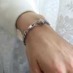 color: E235-Steel Color Snake Head Green Zircon Eye Bracelet 18cm