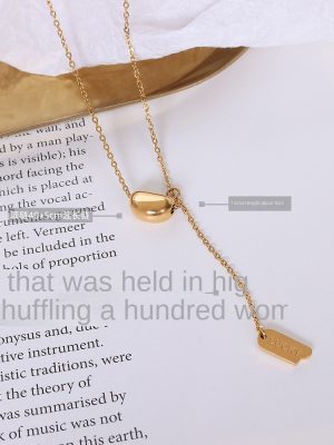 Marka French Design Necklace Steel 18K Gold Plating Little Golden Beans Tassel Lucky Long Board Pendant Ornaments