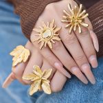 Stainless Steel Flower Sun Ring Women's 18K Real Gold Color Retaining Design Cell Phone Finger Ring