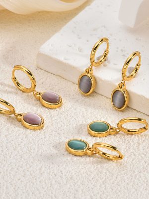Cat-eye drop stainless steel earrings, light luxury, high-end exaggerated earrings, retro big bow women's ear studs.