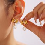 Baroque Natural Artificial Pearl Earrings Women's French Vintage Bow Diamond Stud Earrings Stainless Steel Gold-Plated Light Luxury Earrings