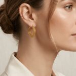 High-end gold wave-pattern stainless steel ear rings, exaggerated versatile twisted-branch earrings, mesh-pattern woven women's ear rings.