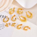 Golden stainless steal earrings, light luxury, high-end, autumn/winter exaggerated earrings, suitable for square and round faces, versatile female stud earrings.