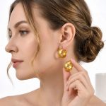 Affordable luxury small pork belly stainless steel earrings, elegant and sophisticated three-strand twisted ear clips with a vintage gold textured finish.
