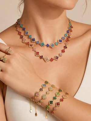 Four-Leaf Flower Inlaid Super Flash Rhinestone Stainless Steel Plated 18K Gold Earrings Ring Bracelet and Necklace Set