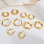 Personality line stainless steel earrings, high-end stud earrings, mild luxury retro gold exaggerated earrings.