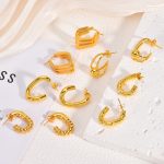 Autumn/Winter gold stainless steel large earrings, light luxury, high-end, high profile retro earrings for women, minimalist design.